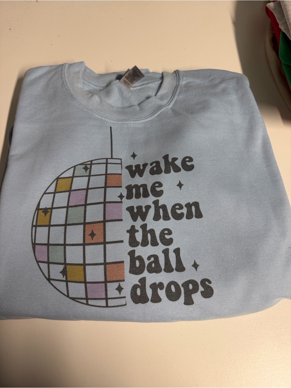 Light Blue Graphic Sweatshirt - "Wake Me When The Ball Drops"